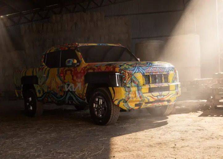 Kia Tasman pickup truck teased with unique camouflage