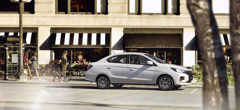 Mitsubishi Attrage Side View on Road