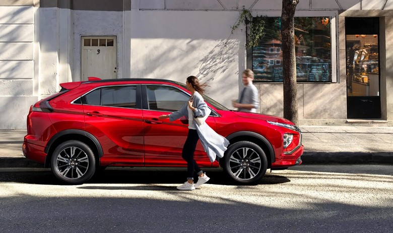 Mitsubishi Eclipse Side View with Passengers Entering