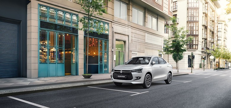 Suzuki Dzire front view in grey color