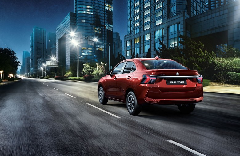 Suzuki Dzire rear view in red color