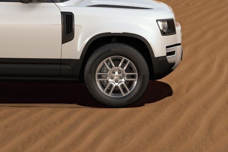 Land Rover Defender 110 side view in white color