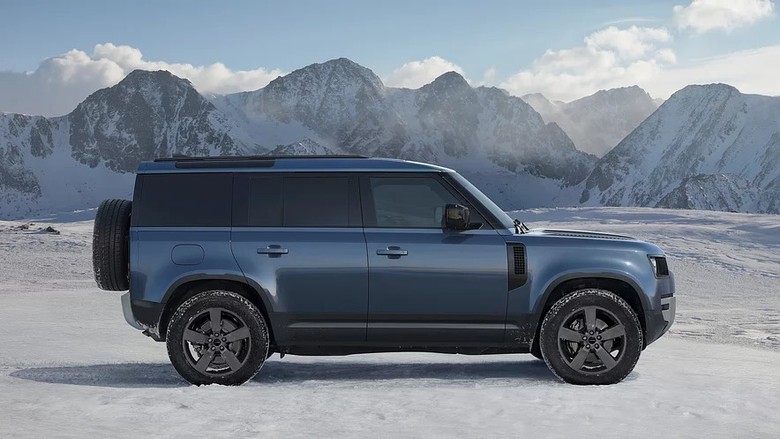 Land Rover DEFENDER 110 side view blue color