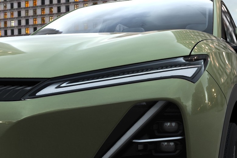 Chevrolet Captiva PHEV lheadight view in green color