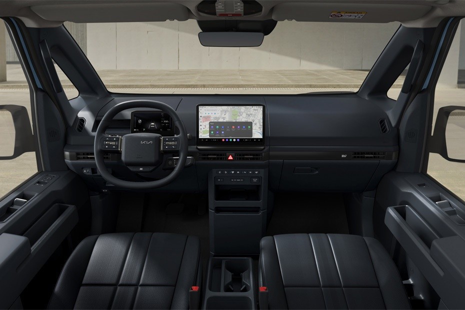 Kia PV5 modern interior with steering and display