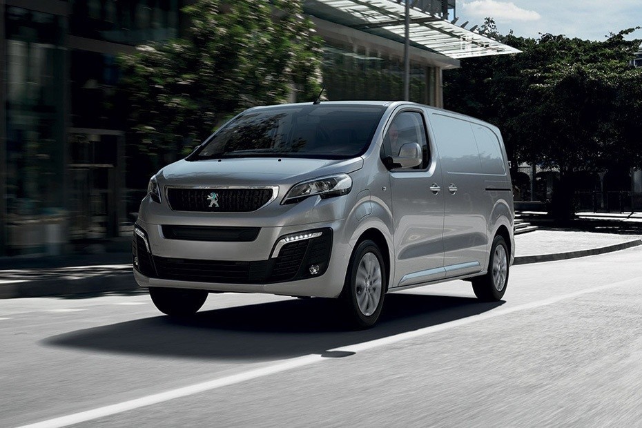 Peugeot Expert van driving on city road